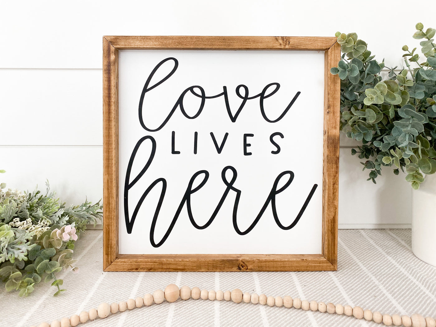 Love Lives Here Wood Sign